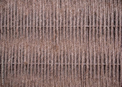Brown tightly woven twine. Closeup of natural background