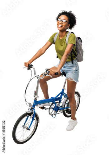 Young african american woman with curly hair and glasses, wearing casual streetwear, sits on a cobalt blue folding bicycle against a transparent studio background, active urban lifestyle concept