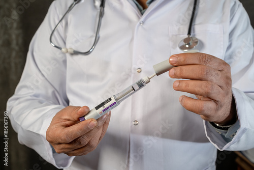 Medical doctor presenting Mounjaro tirzepatide KwikPen medication used for diabetes management and chronic weight loss