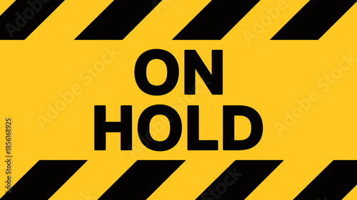 Yellow and black on hold sign with diagonal stripes design