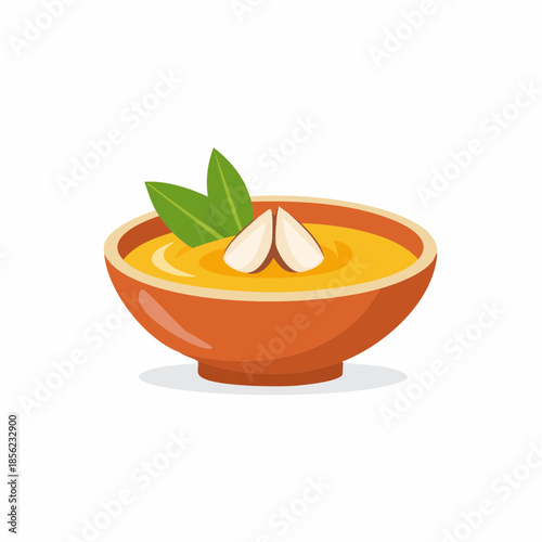 Creamy Yellow Soup in Bowl with Green Leaves and Almonds, Delicious Vegan Meal, Healthy Dish, Vegetarian Food