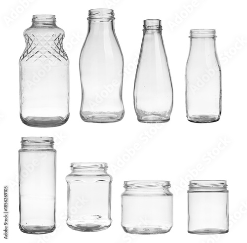 Foto collection of eight assorted empty clear glass bottles and jars, presented on a transparent background for a clean, isolated look, ideal for product mockups and e-commerce