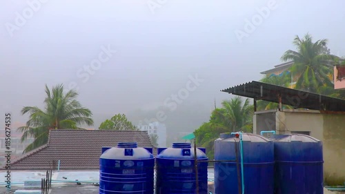 Patong Phuket Thailand panorama with heavy monsoon rain storm clouds.
