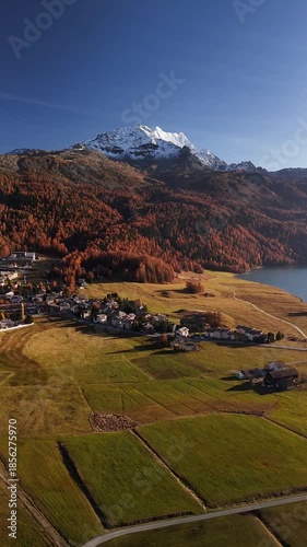 Wallpaper Mural Scenic view of the village of Sils Engadin and Lake Sils Silsersee in the Swiss Alps Torontodigital.ca
