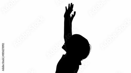 Silhouette of a Child Reaching Upwards.