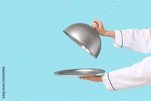Female chef's hands with si...