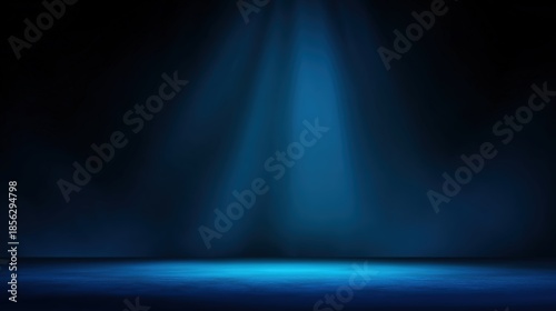 Soft Blue Spotlight Illumination on Dark Background for Performance