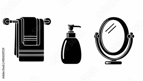 Bathroom accessories including towels soap dispenser and mirror.