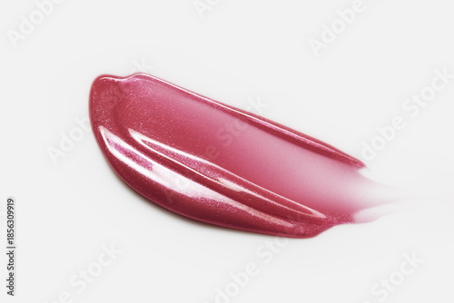 Lip gloss texture. Liquid lipstick smudge swatch smear. Shimmery creamy makeup stroke isolated on white background