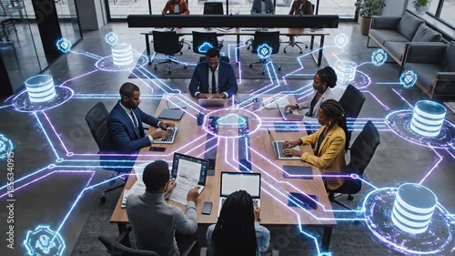 Business team working on laptops with cloud computing and network connections