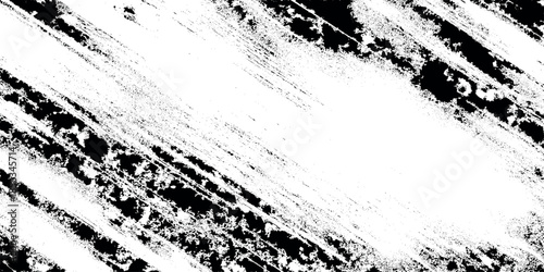 Abstract black and white textured background featuring dynamic diagonal strokes and a visually striking chaotic pattern