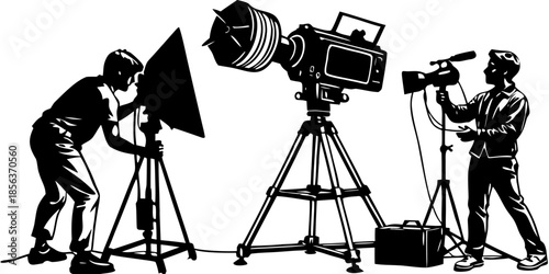 Silhouettes of Film Crew Lighting Technicians Adjusting Studio Spotlights