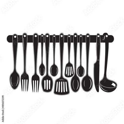 Collection of Cooking Utensils Hanging on a Rack for Kitchen Use