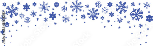 Collection of blue snowflakes and dots scattered across the top of a white background in a decorative border pattern