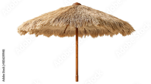 Traditional thatched tiki umbrella with bamboo pole for summer vacation concept.