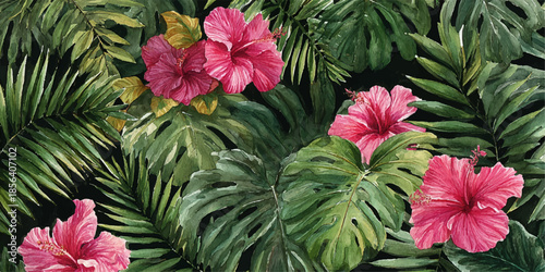 Tropical hibiscus flowers amidst lush green leaves