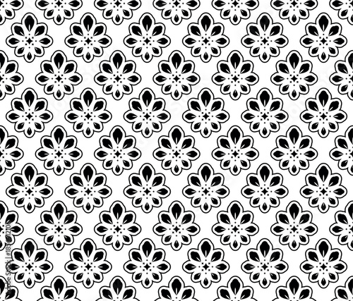 Flower geometric pattern. Seamless vector background. White and black ornament.