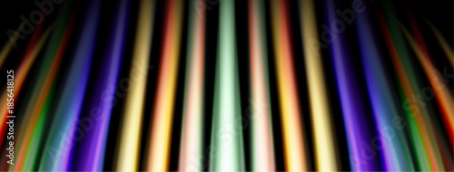 Vertical colorful light streaks dominate image. Black background creates strong contrast, vibrant display. Lines converge toward distant point.