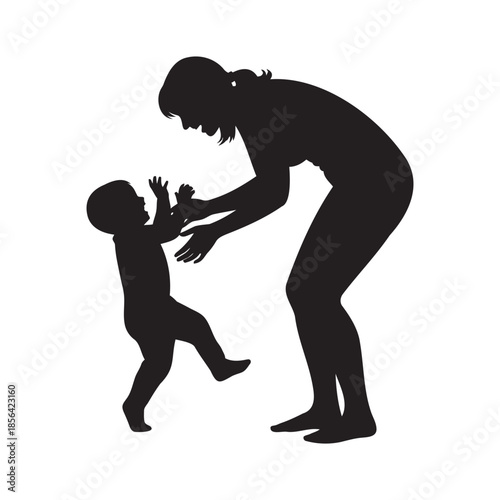Baby learning to walk with parent's help silhouette