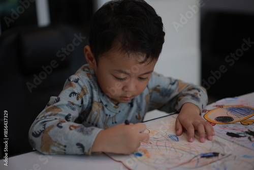 little boy drawing