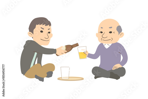 向かい合って晩酌する孫とおじいさん