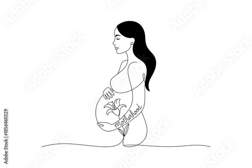 A pregnant woman with a tattoo of a palm tree on her belly