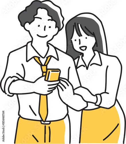 スマホの画面を覗く男女社員