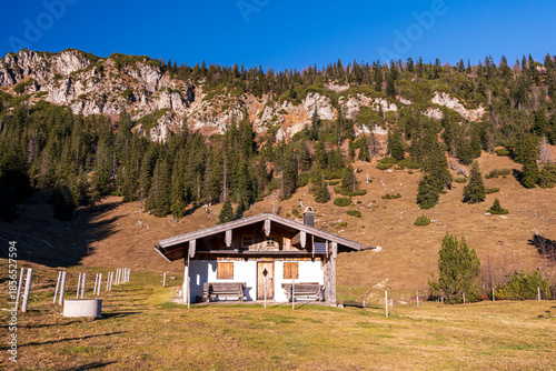 A hike along the Bavarian Chiemgau on the way to the Hochfelln peak and stop by beautiful farmers sheds