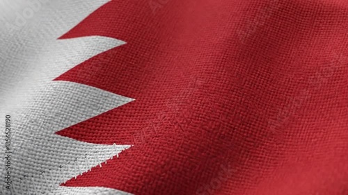 Bahrain national flag waving smoothly in the wind. High-quality animated background representing sovereignty, government, freedom, and Arab nation concepts.