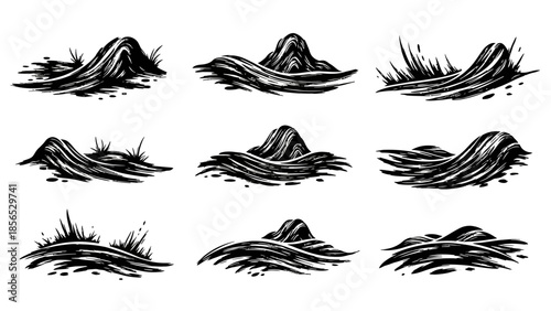 Set of nine hand drawn abstract ink brush strokes.