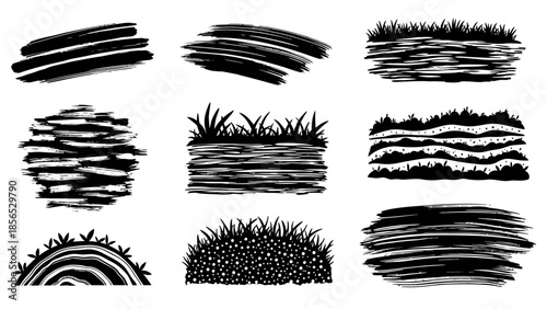 Set of various hand drawn black ink brush strokes and grass textures.