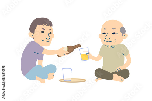 おじいちゃんにビールを注ぐ孫