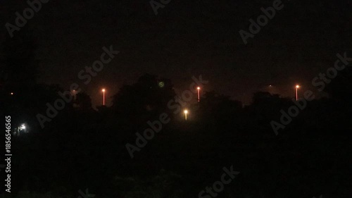 Streetlights illuminate the streets at night, making travel safer in the countryside.