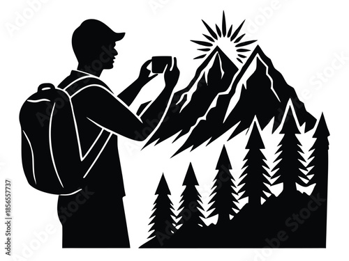 Photographer Hiking in Mountains Taking Photo of Mountain Landscape Silhouette