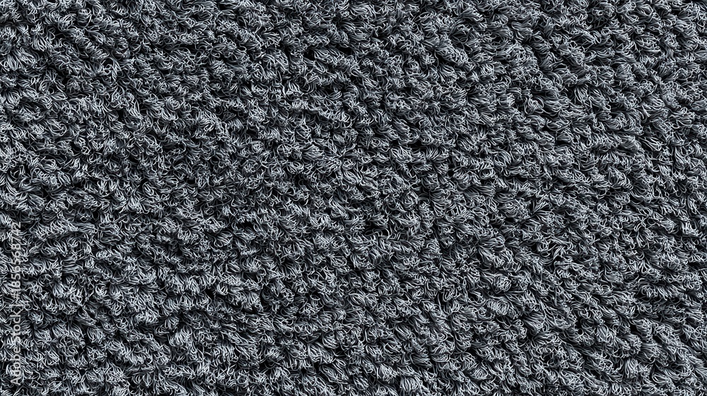Fototapeta premium Detailed close up of dark grey tightly curled fabric texture.
