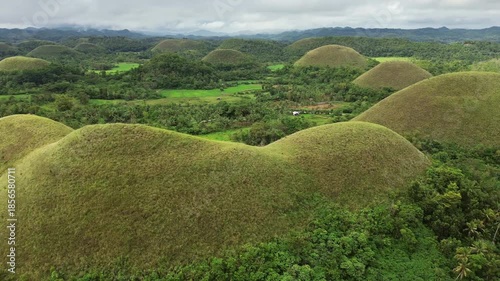 Aerial around view of Chocolate hills - geological formation on Bohol island, Philippines, 4k