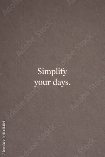 Minimalist motivational quote typography on neutral textured background