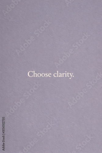 Minimalist motivational quote typography on neutral textured background