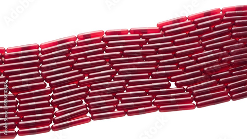 Stack of red shotgun shells isolated on black background, ammunition for hunting and shooting sports