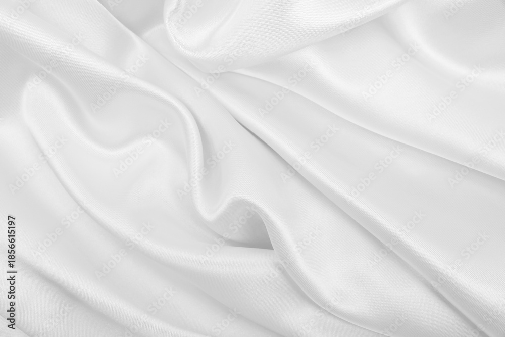 Fototapeta premium Smooth elegant white silk or satin luxury cloth texture as wedding background. Luxurious background design
