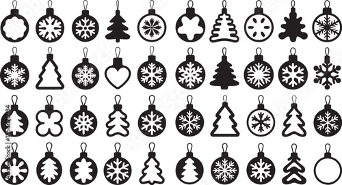 Black and white Christmas ornaments and trees hanging on strings