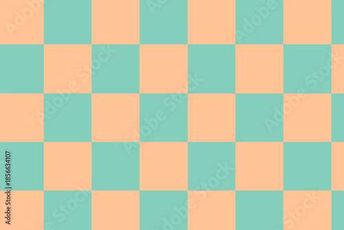 Checkerboard pattern in green and orange colors on a flat surface