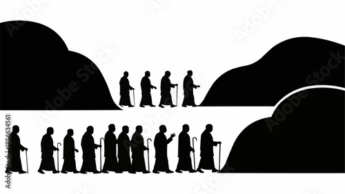 Monks walking in a line with walking sticks silhouette.