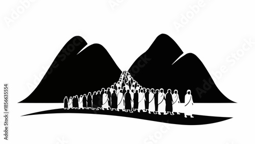 People walking in a line towards mountains in silhouette.