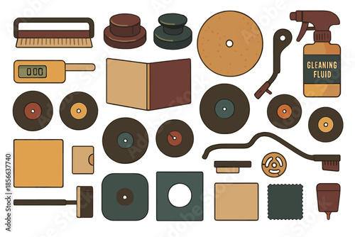 Collection of cleaning tools and supplies for vinyl records displayed on a white surface in a workshop or studio environment
