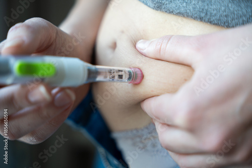 Принти на полотні Diabetic patient injecting insulin into the abdomen