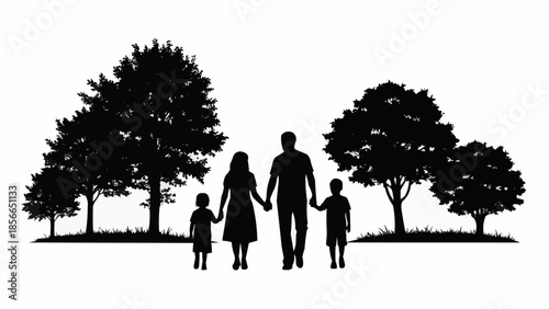 Silhouette of a happy family walking together holding hands outdoors.
