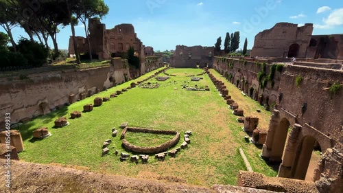 domus augustana ruins including palatine stadium or hippodrome domitian palace hill show massive arched substructures grass covered courtyard rome italy emperor 