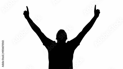 Silhouette of a man raising his arms in victory celebration.