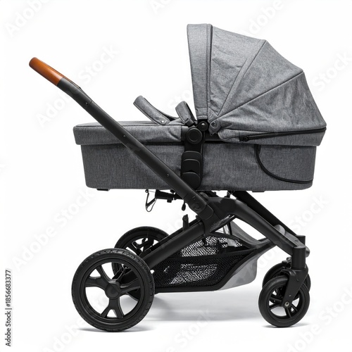 Gray stroller, side view, showcasing a bassinet with a canopy